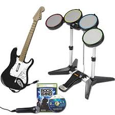 WII: CONSOLE - ROCK BAND BUNDLE INCLUDES: WII CONSOLE - ROCK BAND GAME - 1 FENDER GUTIAR W/DONGLE, 1 DRUM SET, 1 MIC, 1 WII MOTE, STICKS, 1 GB MEMORY CARD AND HOOKUPS (USED) (COMPLETE SET)